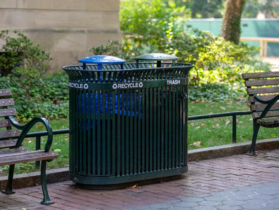 Green metal slatted trash and recycling cans on 36th Street Walk