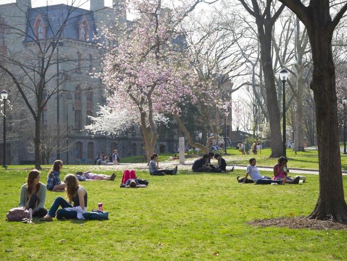 People sitting on college green